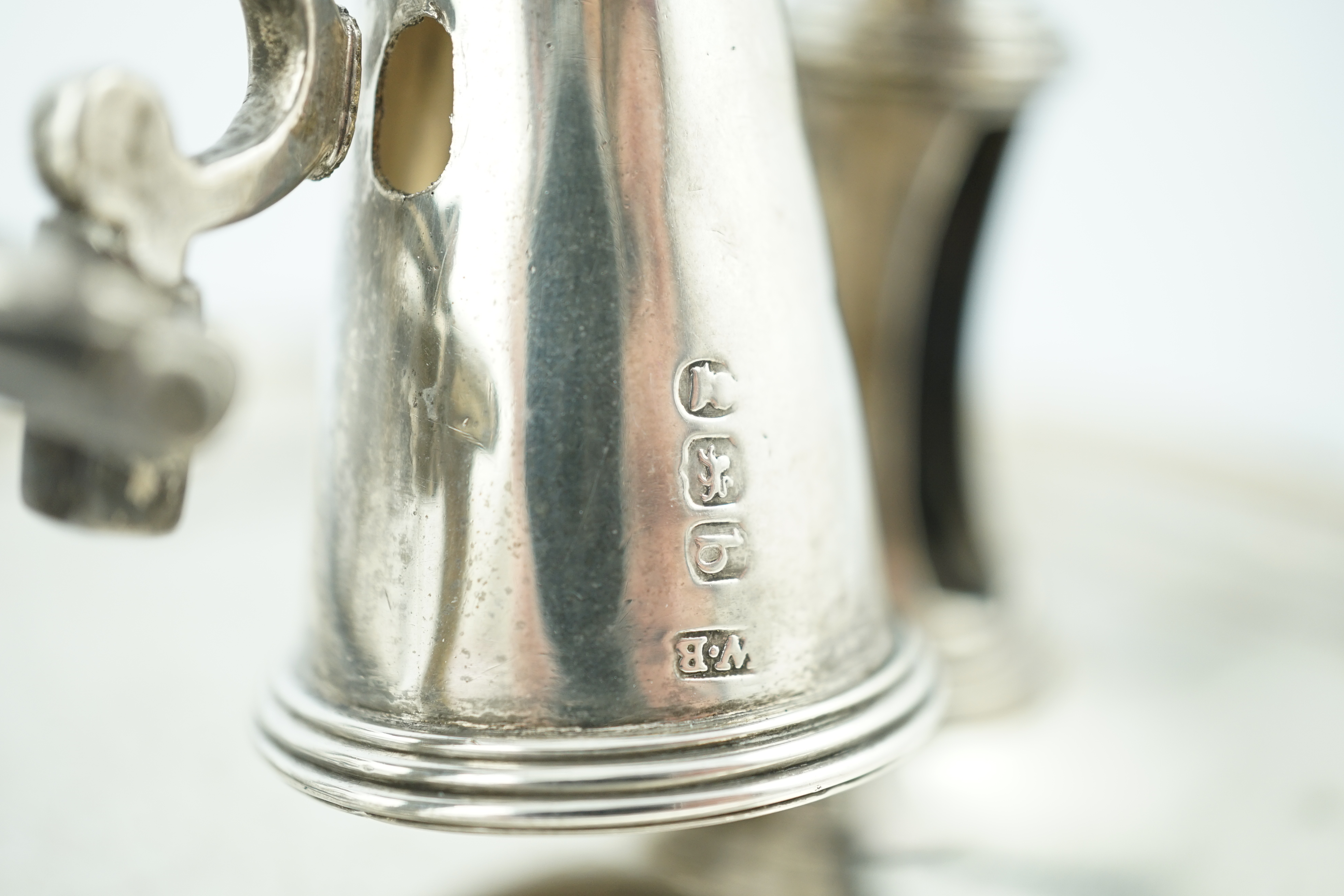 A pair of George III silver chambersticks, by Walter Brind